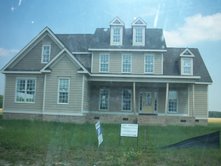 Buy Real Estate Now!